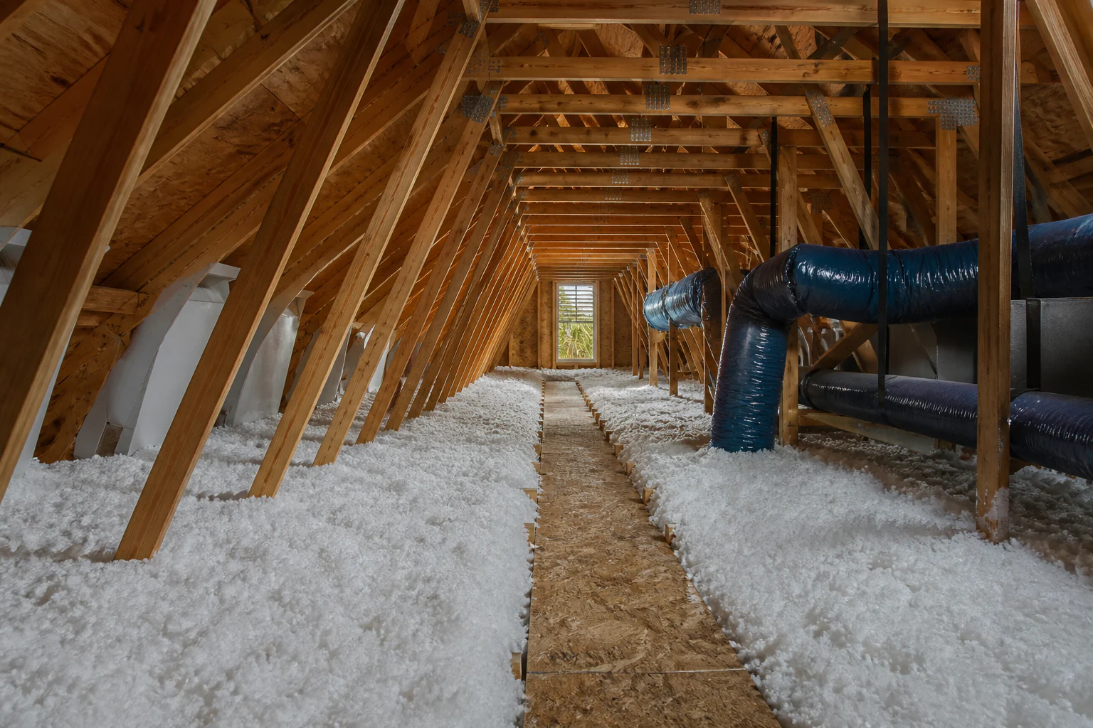 Loose-fill insulation coverage across an attic floor
